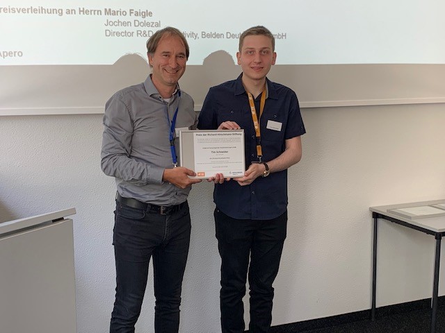 Prof. Stephan ten Brink and Tim Schneider, one of the five award winners